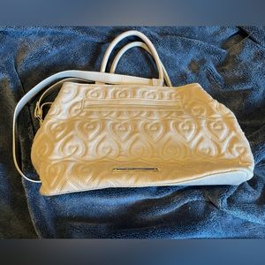 Gray quilted Betsey Johnson tote purse. Holds a ton with 3 main pockets.